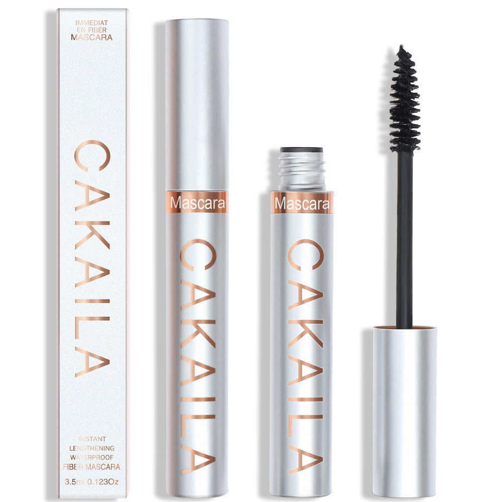 Cakaila mascara with packaging and wand on a white background