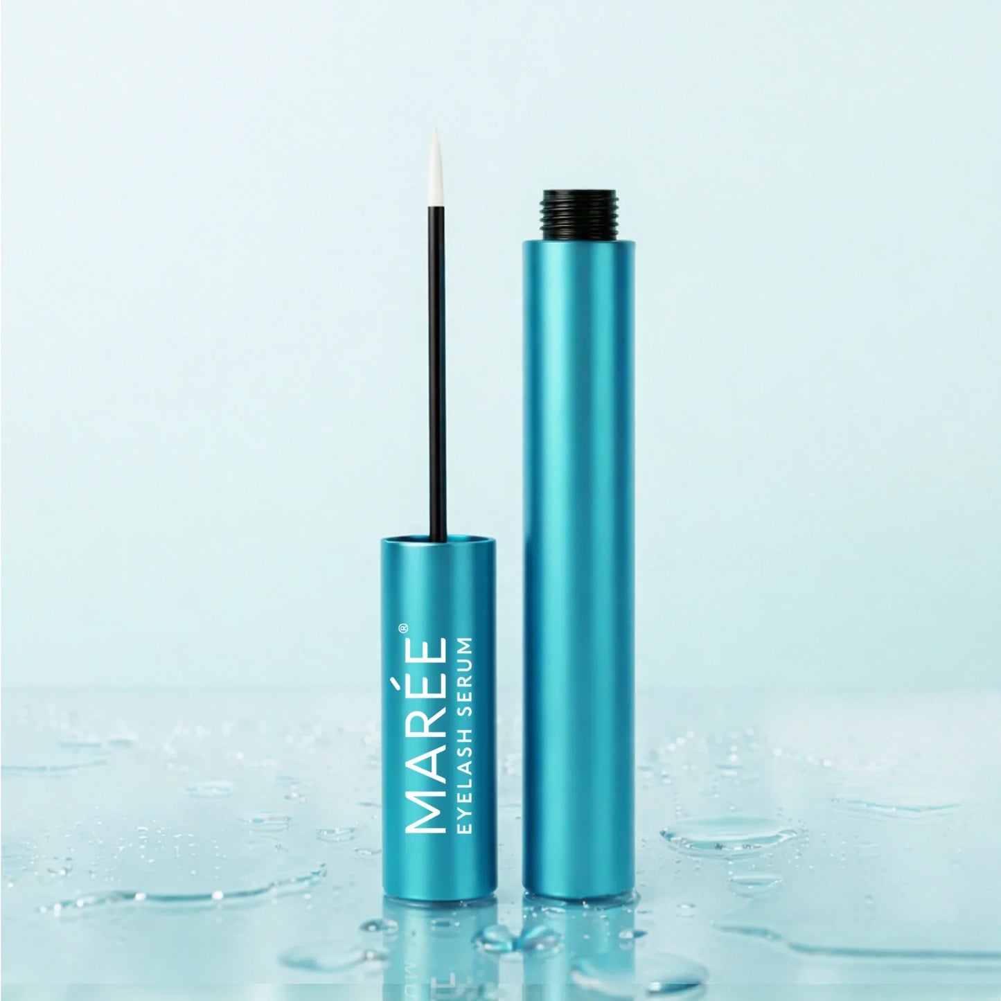 Mareé eyelash serum with blue packaging on a light blue background