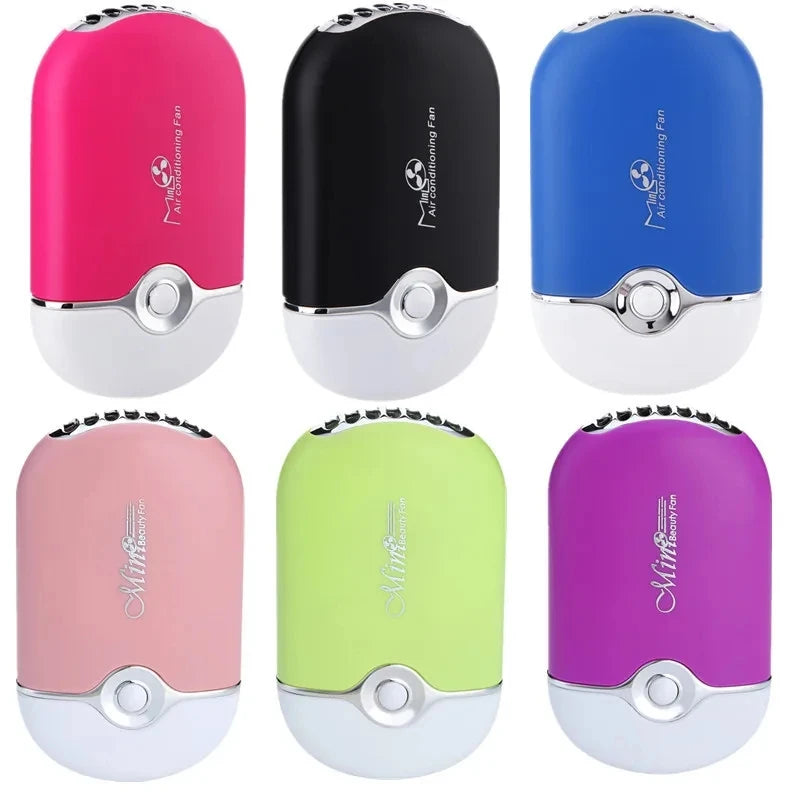 Set of six colorful handheld hair dryers on a white background